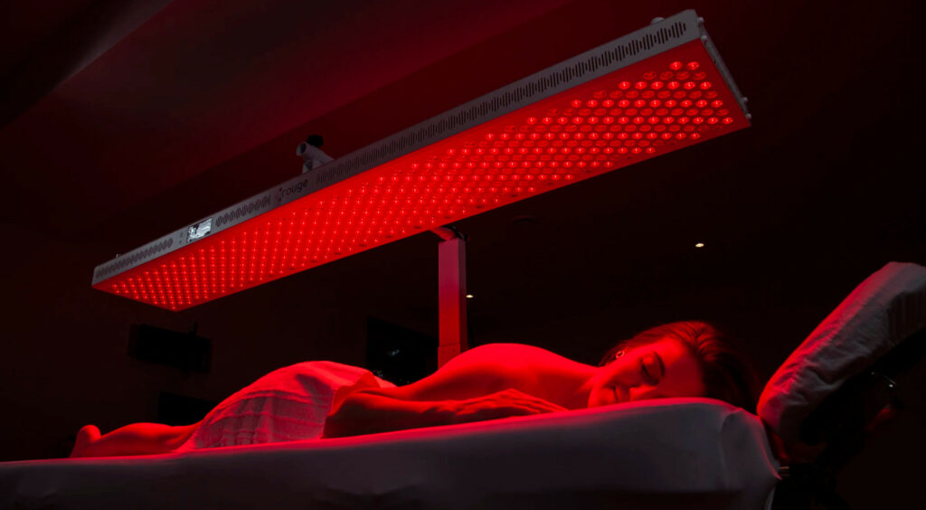 ZenGlow red light therapy device in use